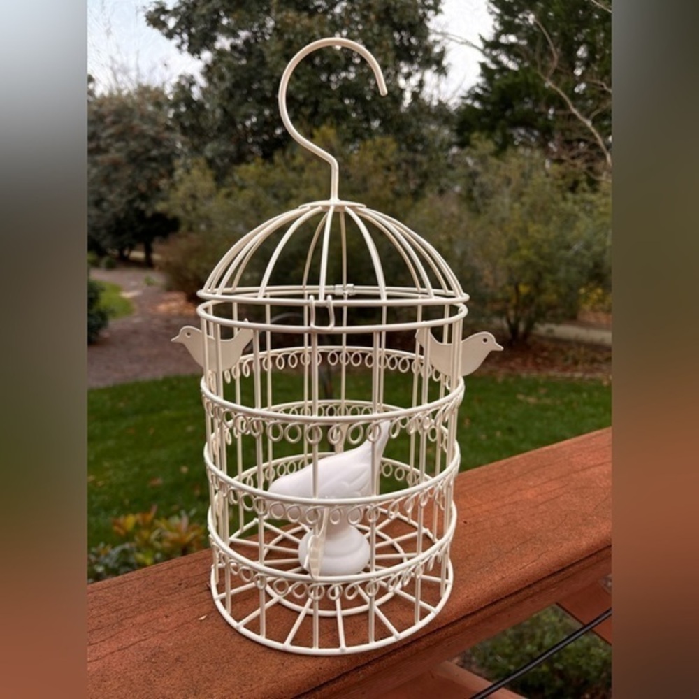 Decorative bird cage. White with birds accent. Metal cage